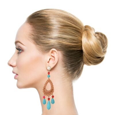 Make a statement with these beautiful boho rattan earrings. Accented by a turquoise color drop howlite stone, red jade beads and 24k gold-plated elements, hanging from a pearl stud. They are light to wear, perfect for hot summer days. Note that all rattan pieces are unique, so patterns may vary.
