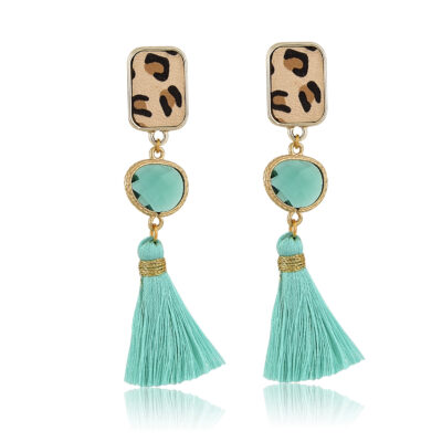 Wild cute and easy to wear, these drop-earrings are made of a beautiful faux leather leopard motif & mint silk tassels. A light pair of earrings, wearable day or night, to complete a formal outfit, or to elevate a casual one.