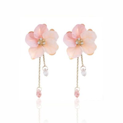 Soft pastel petals that look like actual blossom.  Stunning and highly detailed, each petal has a soft gradient of color from soft pink to blush. The hint of sparkle on the inside, and little crystal drops, makes these earrings, perfect for classically romantic souls. Perfect for bridesmaids or prom day.