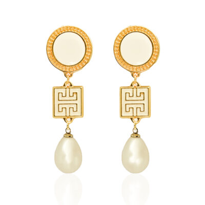 This collection is inspired by ancient Greek jewelry with a modern vision. You'll turn heads with these elegant Grecian earrings. A fine gold-plated meander with a beautiful cream enamel finish and a dangling pearl, hanging from a smooth ivory gold framed stud, is what makes these earrings unique. You can wear them all day or for a formal event.