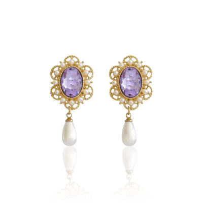 The design and detail of these vintage Victorian earrings are breathtaking. The center feature an elegant lilac stone within a lacy gold filigree frame. This particular cameo frame is adorned with small pearls, ending in a pearl teardrop. While they have a dramatic visual aspect, they are very lightweight and easy to wear.