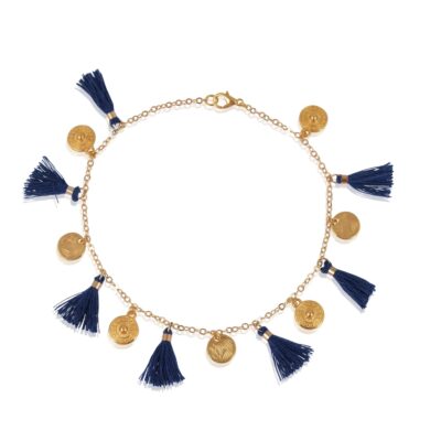 Blue marine tassel anklet. Including tassels and textured disk charms, you can't go unnoticed. Complete your Bohemian look while putting on this anklet. Available in gold and silver tones.