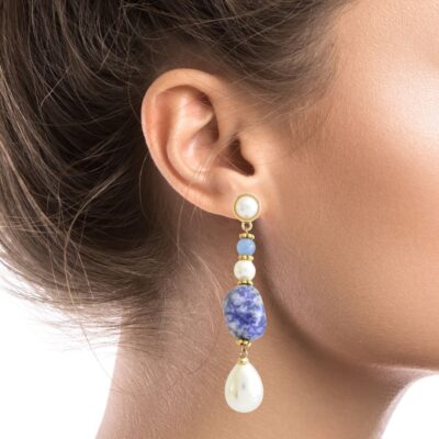Anamae sodalite earrings are crafted from 24k gold-plated brass and embellished with pearls, light blue jade stones and pearls drops. A stunning blue pearl and gold combination. Polished and refined, style your earrings with any casual or formal outfit.